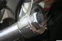 nstall the fork tube caps (1) and washers (2).